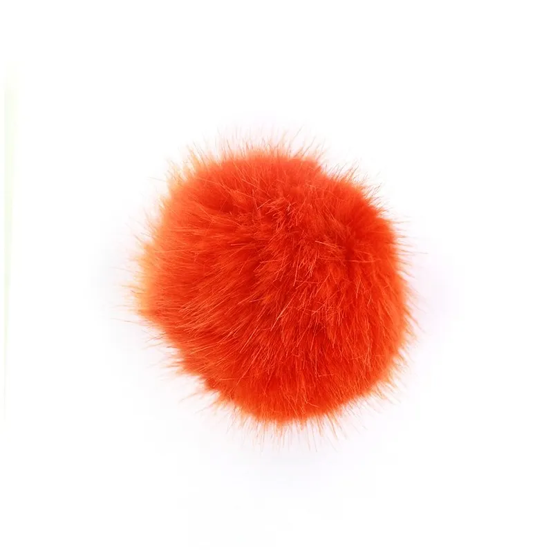 Pompon rond fausse fourrure orange